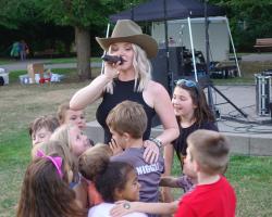 Brittnee Kellogg singing with kids