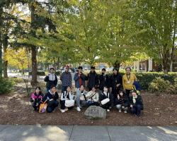 Kitakata students at a cherry tree by Wilsonville City Hall