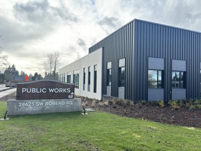 Exterior shot of public works complex and sign